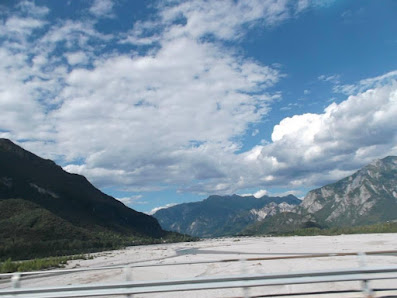 A picturesque view of Bristol Mountain's ski resort in upstate New York, featuring a charming chalet. Ski lifts are subtly visible against the backdrop of the snow-dressed mountain.