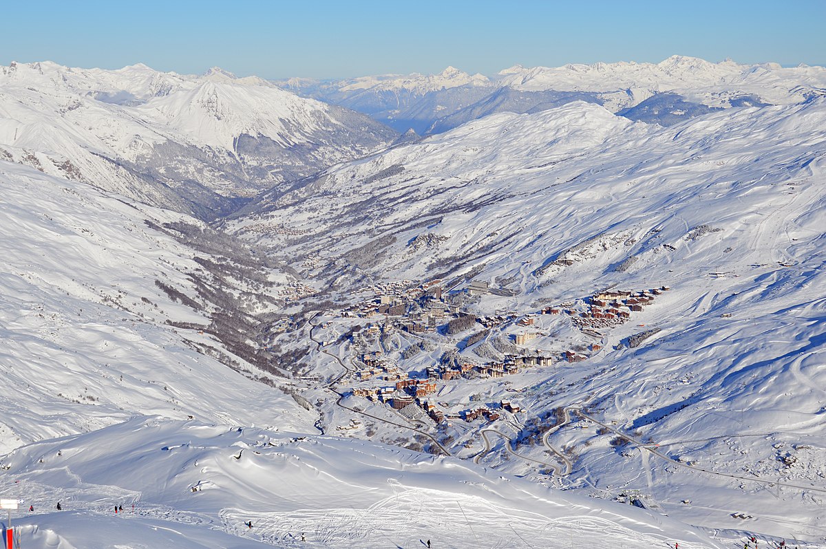 Les 3 Vallées in France - a view from the top of a snowy mountain.