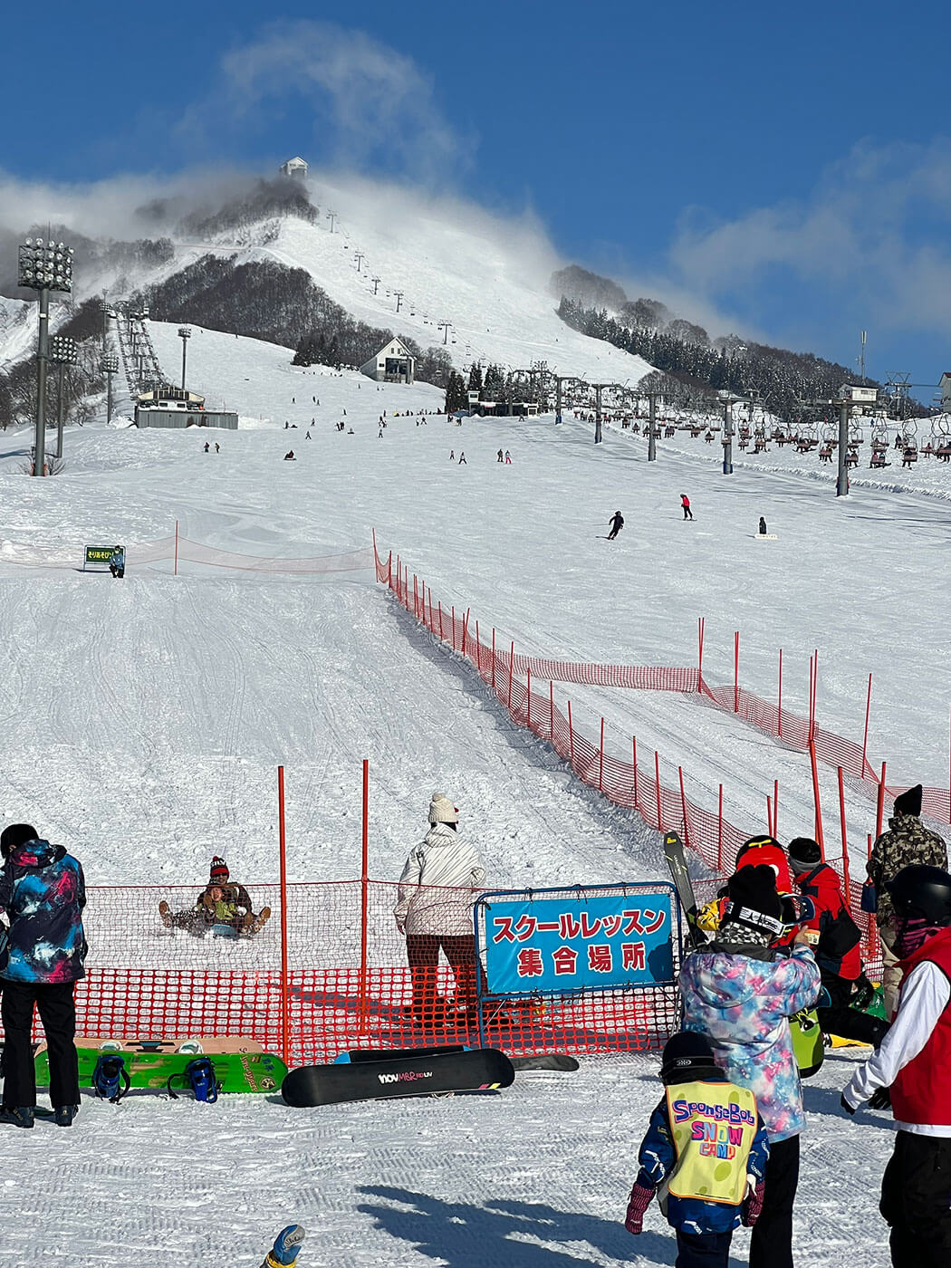 Iwappara in Japan - a group of people standing on a snowy slope.