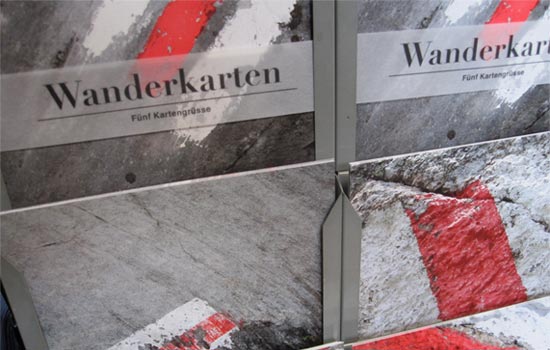 A stunning winter landscape in Mijoux - La Faucille with a prominent chalet, filled with winter sports enthusiasts enjoying skiing in a well-equipped sports centre.