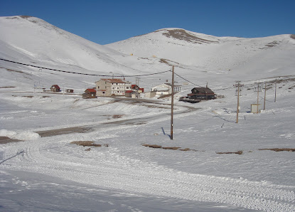 A picturesque view of Falakro in Drama Greece featuring a charming chalet a hub for winter sports activities. The ski resort located amidst winter scenery encapsulates the essence of the vibrant winter sports scene.