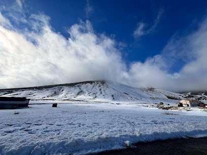 A striking winter scene in Falakro Drama Greece showcasing a snowy mountain range accentuating the charm of Eastern Macedonia. The perfect destination for winter sports enthusiasts.