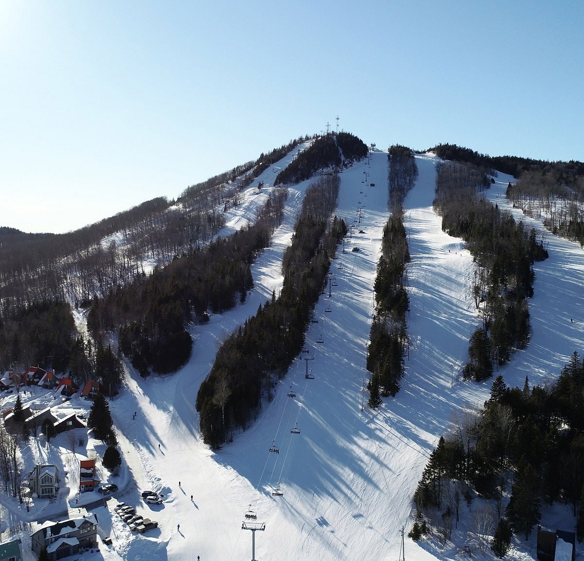 Mont Orignal in Canada - a ski slope with a lot of snow on it.