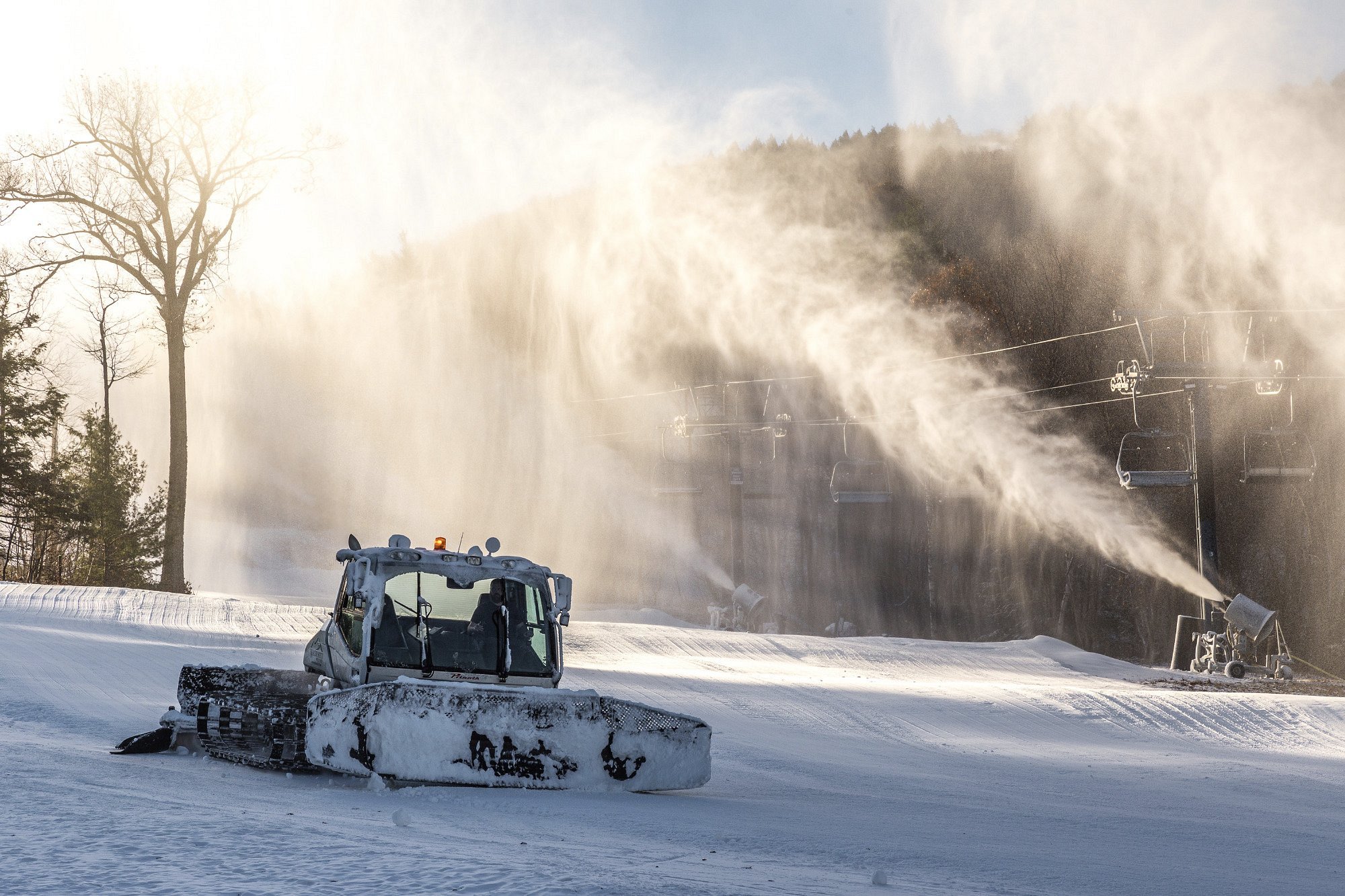 Wachusett Mountain Ski Area in USA - a snow pling machine in the snow.