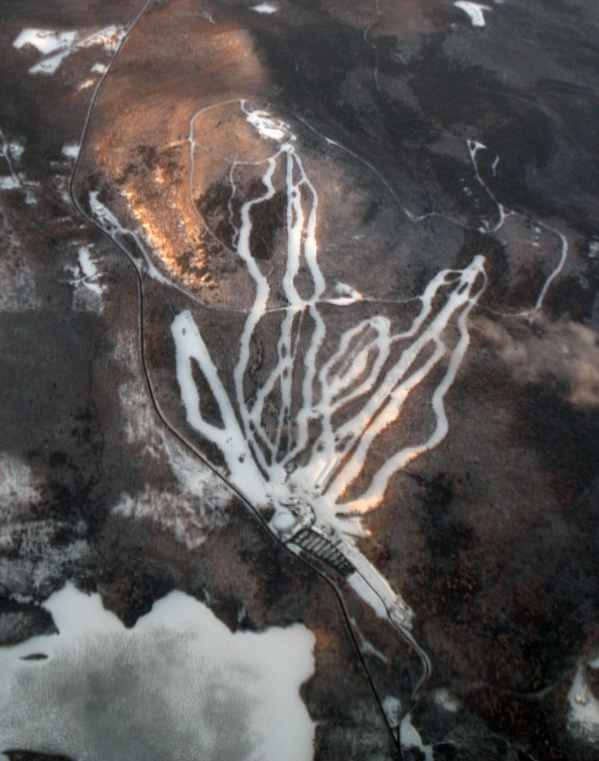 Wachusett Mountain Ski Area in USA - an aerial view of a snow covered landscape.