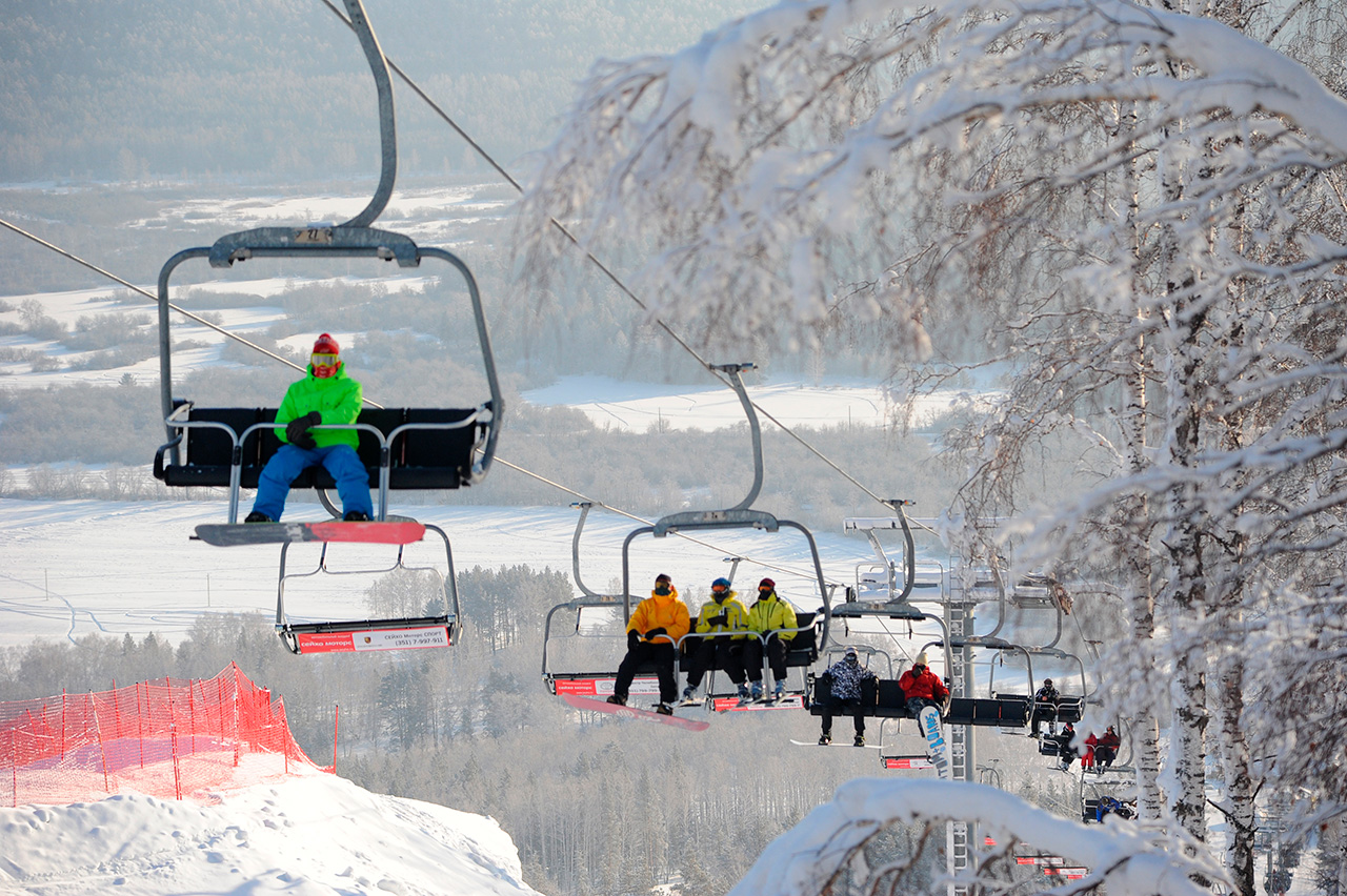 Zavyalikha in Russia - a group of people riding a ski lift.