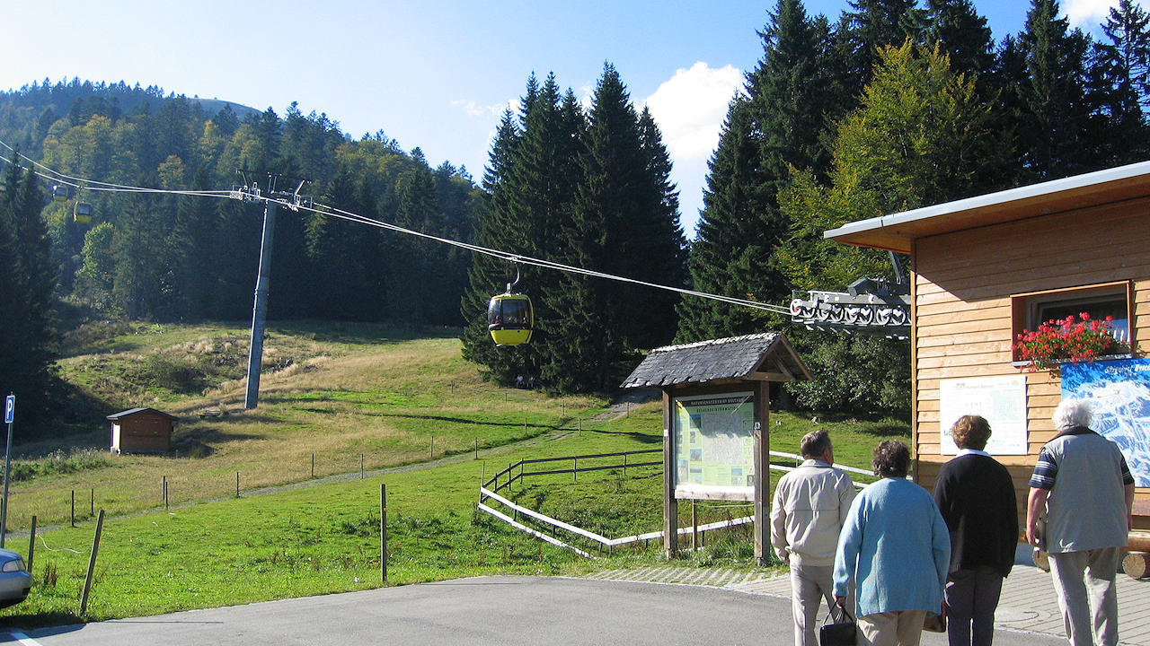 Belchen in Germany - a group of people walking down a road.