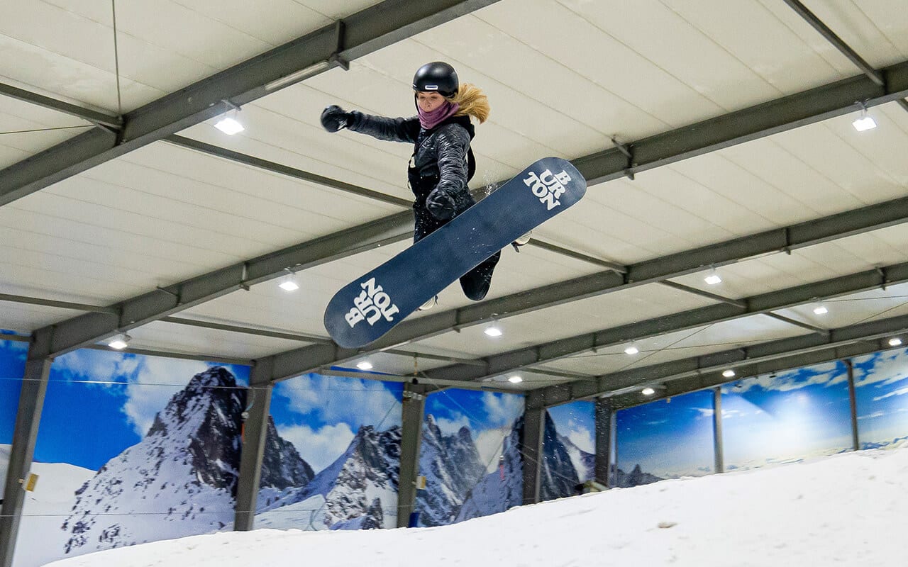 Snowplanet – Silverdale in New Zealand - a snowboarder in the air.