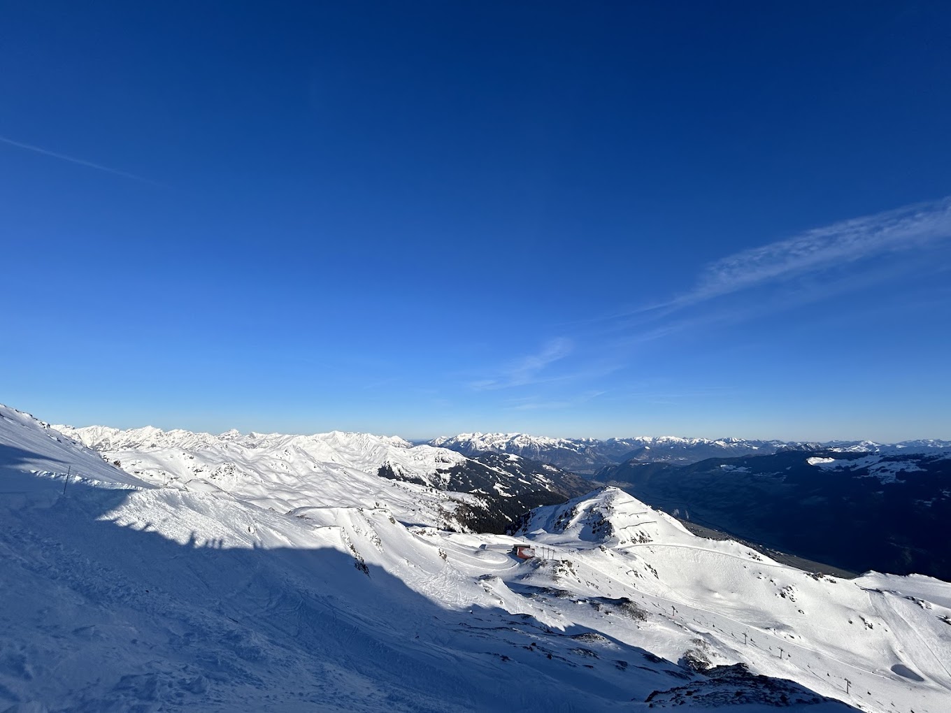 Hochzillertal | Hochfügen in Austria - a view from the top of a snowy mountain.