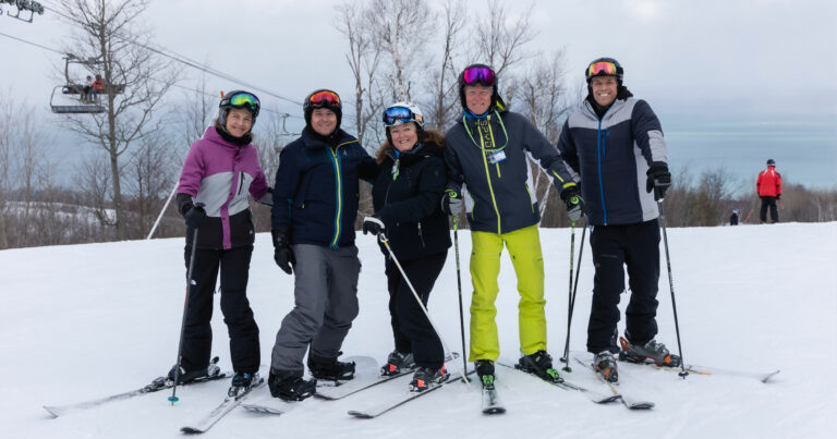 Alpine Ski Club – Collingwood in Canada - a group of skiers posing for a picture.