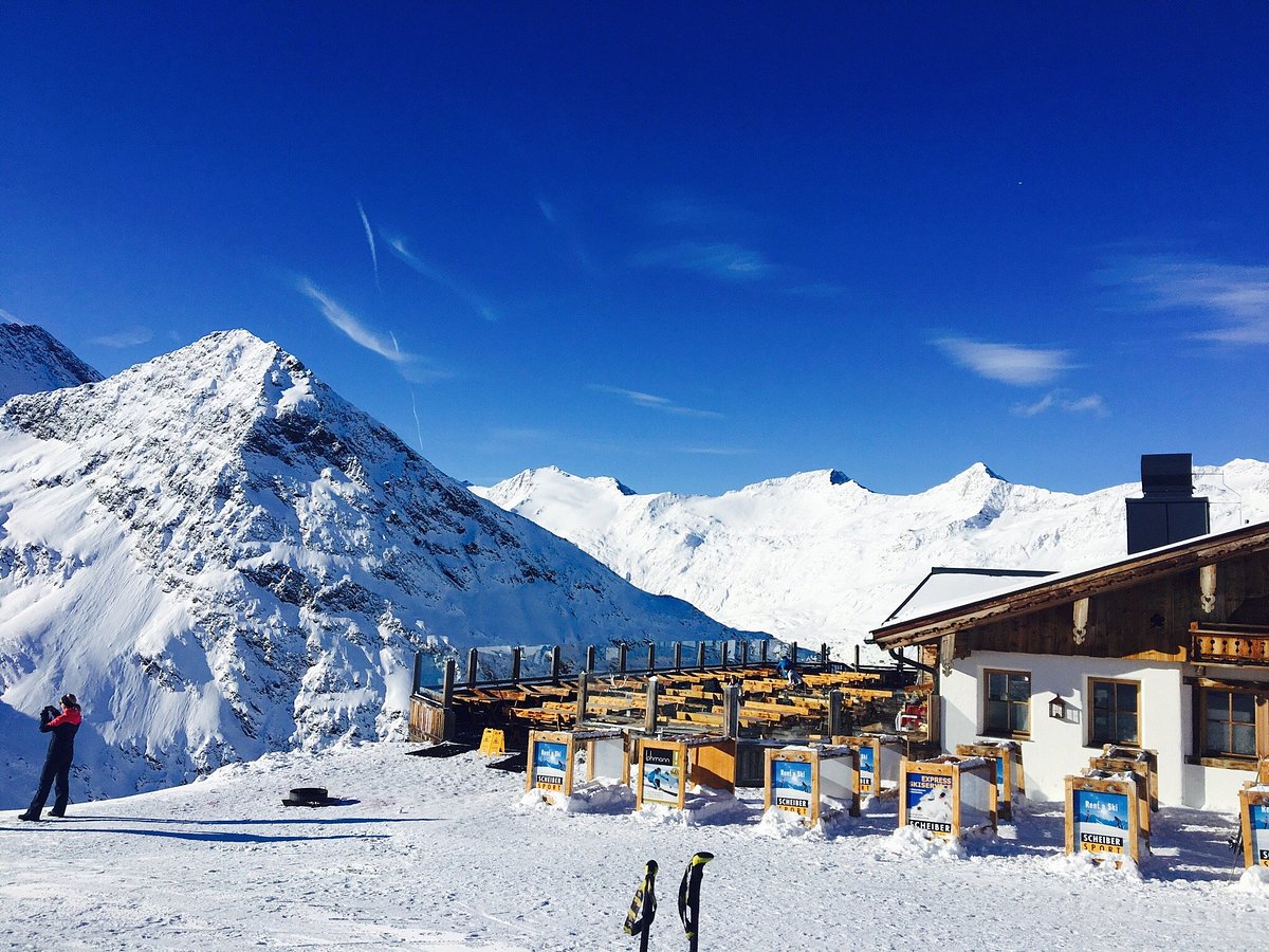 Obergurgl Hochgurgl in Austria - a group of people standing on top of a snow covered mountain.