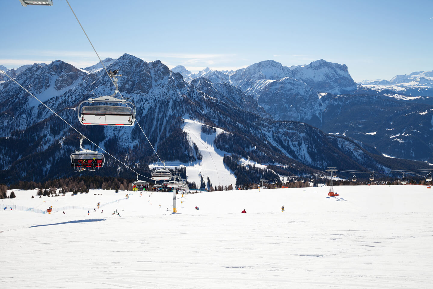 Kronplatz in Italy - a ski lift going up the mountain.
