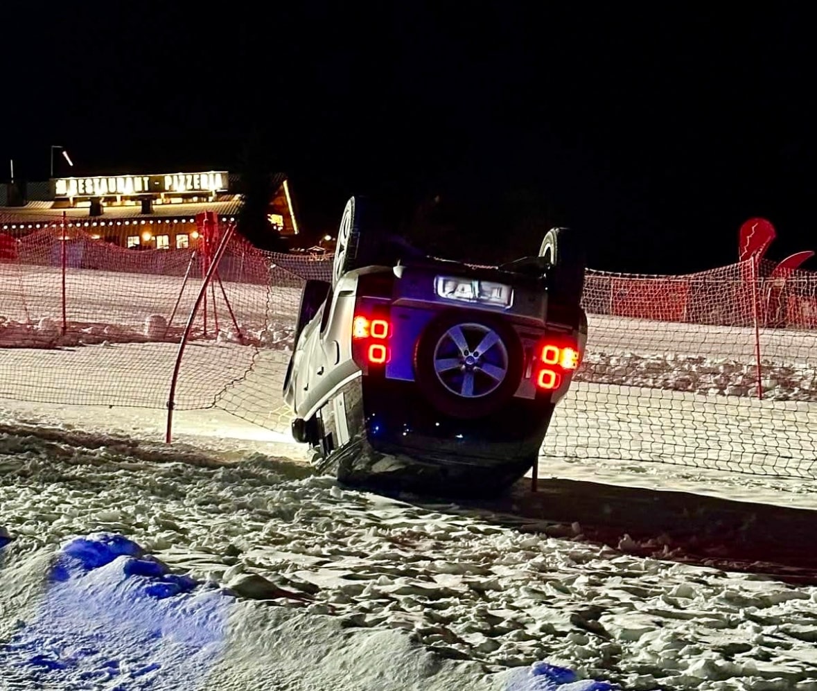 Kronplatz in Italy - a car that is sitting in the snow.