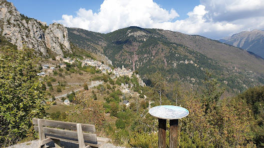 A picturesque French chalet in Roubion les Buisses nestled amongst the mountains. A ski lift and mountain bike subtly hint at the adventurous activities available.