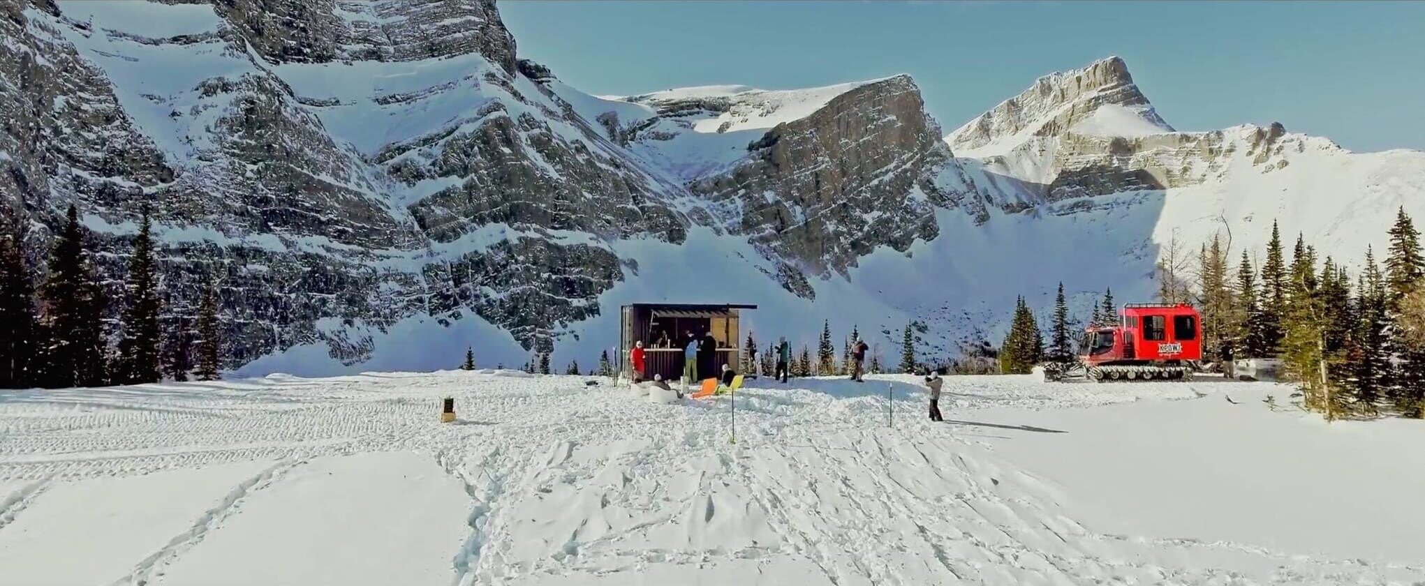 Fortress Mountain ski area in Canada - an image of a snowy road with mountains in the background.