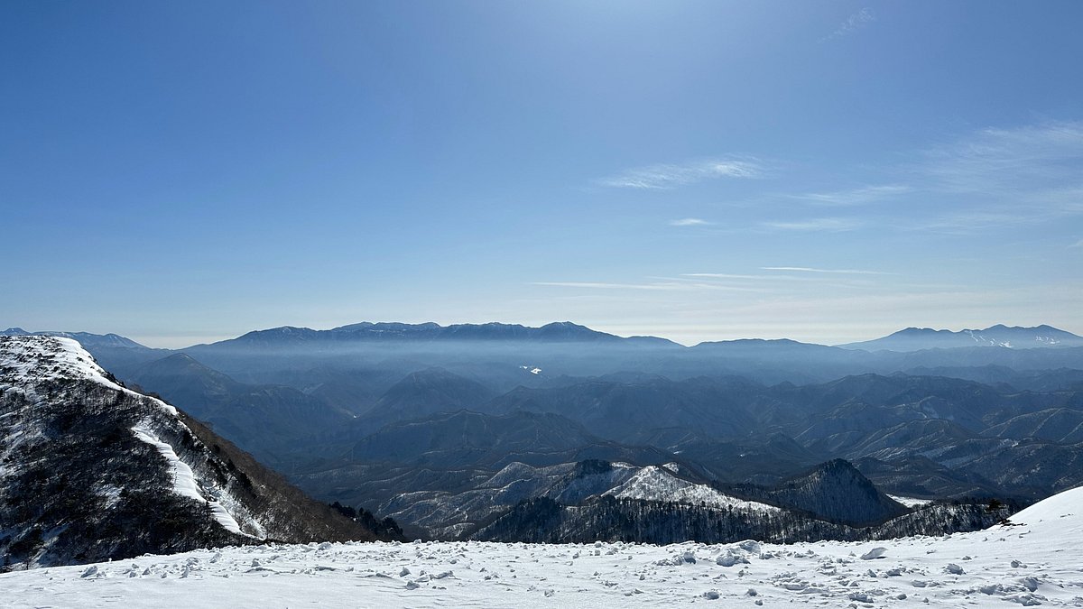 Aizu Kogen Takatsue in Japan - a view from the top of a snowy mountain.