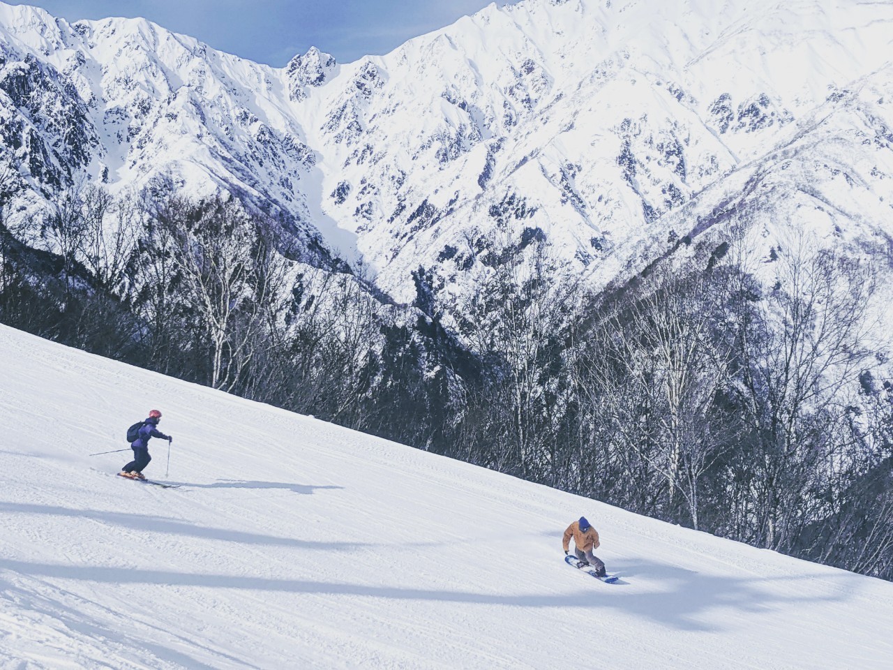 Sugadaira Kogen Taro in Japan - a person skiing down a snow covered mountain.
