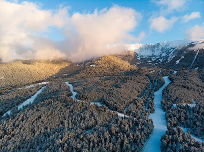 Winter sports scene at the Cambre d'Aze – Eyne ski resort in Saint-Pierre-dels-Forcats, France. Stunning winter scenery of a mountain landscape.