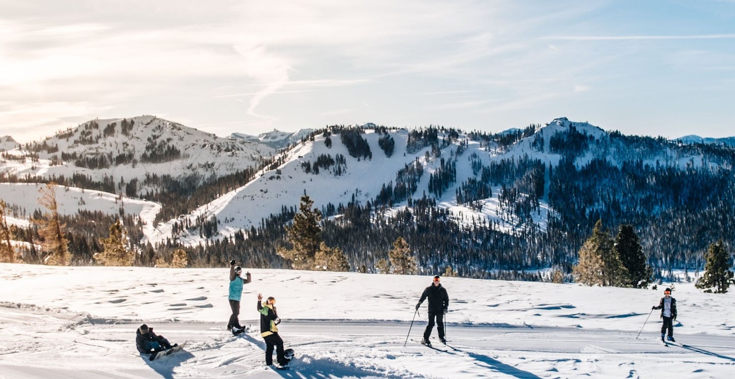 Boreal Mountain California in USA - a group of people skiing down a snow covered mountain.