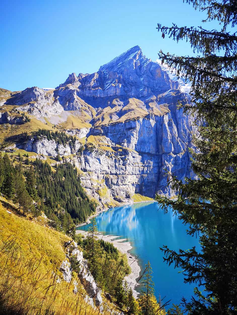Oeschinensee in Switzerland - a blue lake in the mountains.