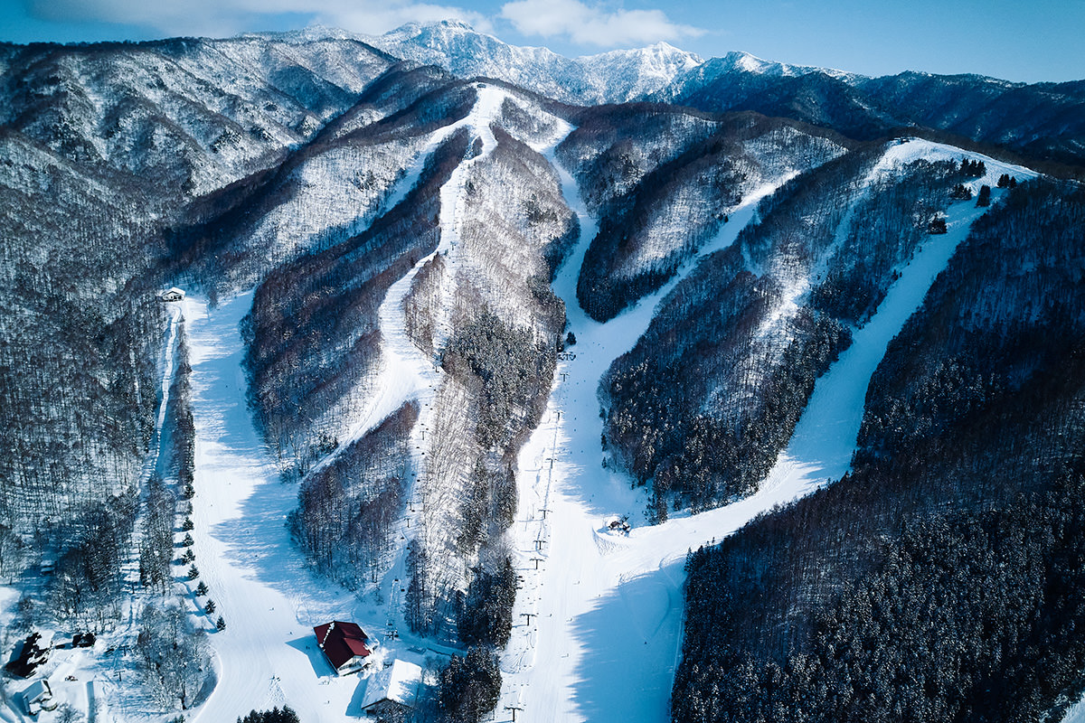 Hodaigi Ski Resort in Japan - a view of a ski area with a mountain in the background.
