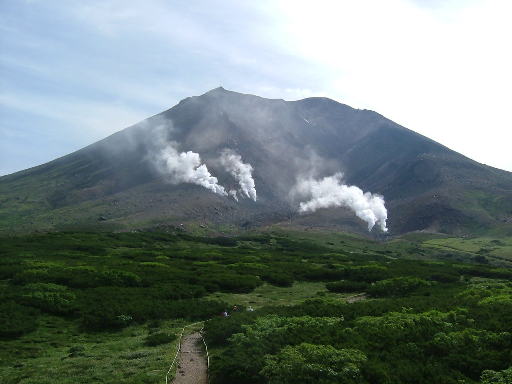 Aizu Kogen Daikurayama in Japan - a view of a volcano in the distance.