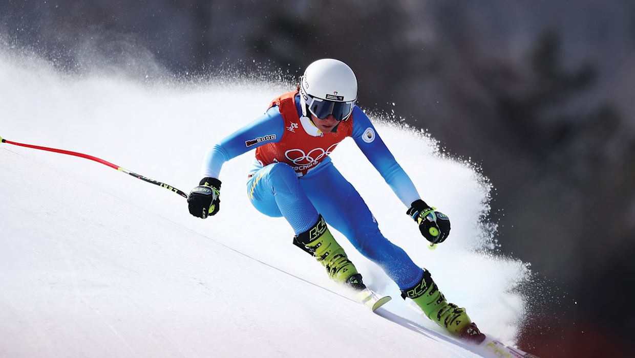 Duole Meidi Ski Field in China - a skier skiing down a slope in the snow.