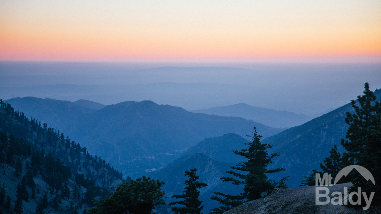 Mt Baldy in USA - a view of a mountain range at sunset.