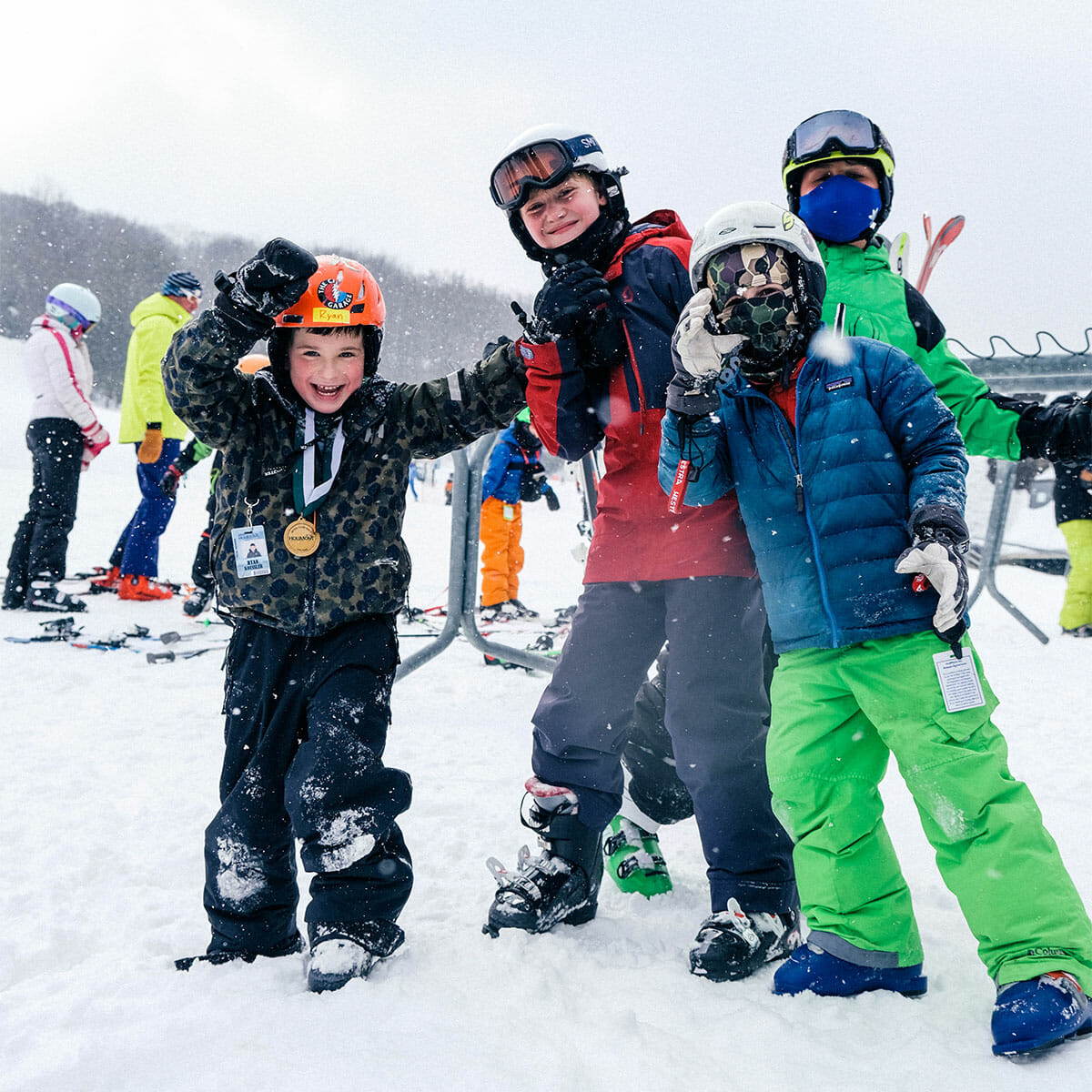 Holimont in USA - a group of kids standing in the snow.