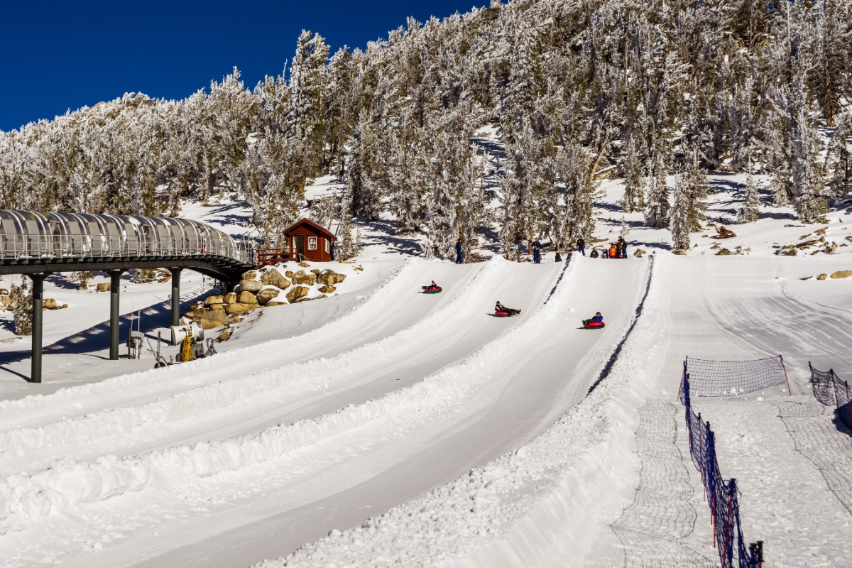 Butternut in USA - a snow covered ski slope with people on it.