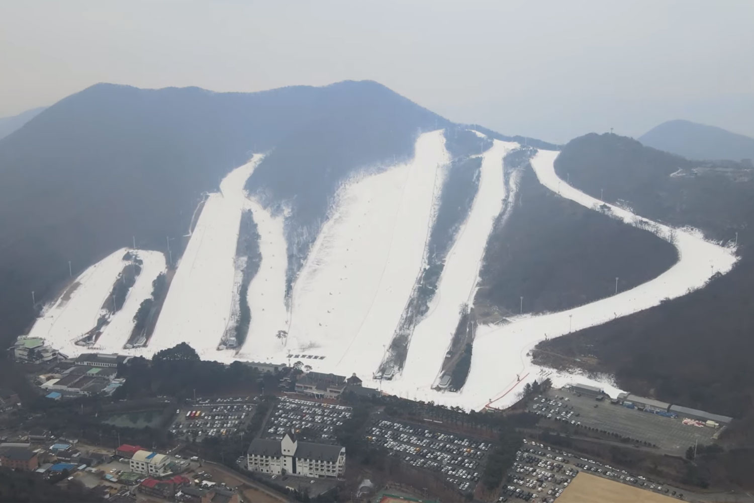 Jisan Forest Resort in South Korea: an aerial view of a ski resort in the mountains.