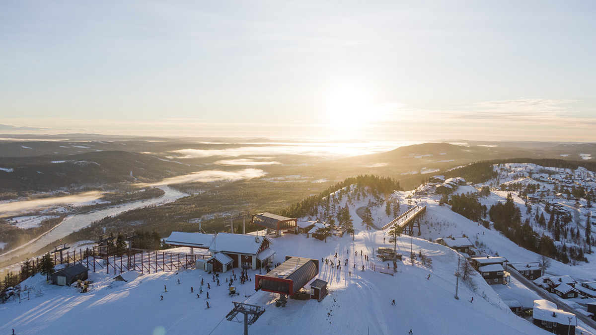 Branäs in Sweden - a group of people skiing down a snowy hill.