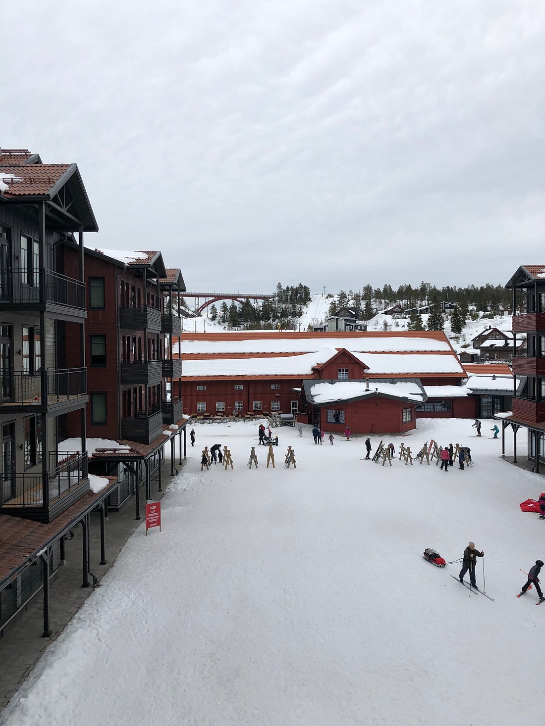 Branäs in Sweden - a group of people skiing down a snowy slope.