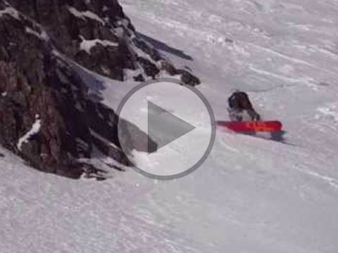 A snowboarder cruising down the snowy slopes of Glencoe Mountain in the Scottish Highlands enveloped in the serene and chilled environment.