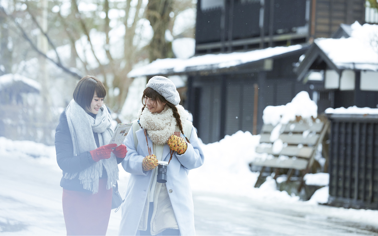 Chokai Kogen Yashima in Japan - two women walking in the snow.
