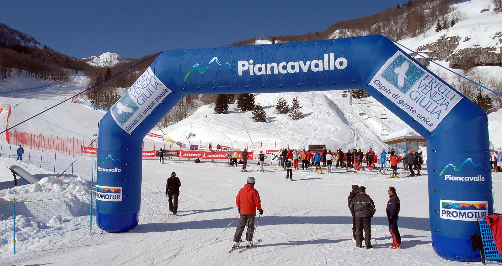 Piancavallo in Italy - a group of people standing in the snow.