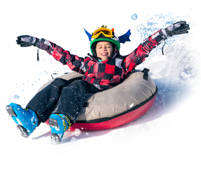 A snowboarder swiftly gliding down the snow-blanketed slopes of Cascade Mountain in Portage, Wisconsin. The clear, blue skies above add a serene atmosphere to an exhilarating run.