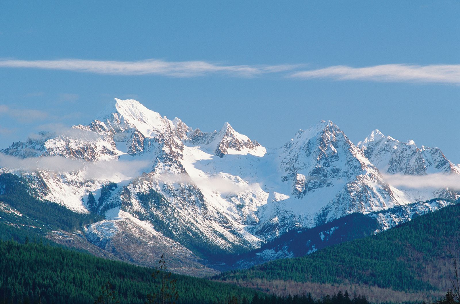 Cascade Mountain in USA - a mountain range with snow covered mountains in the background.
