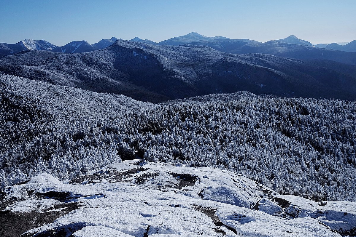 Cascade Mountain in USA - a view from the top of a snowy mountain.