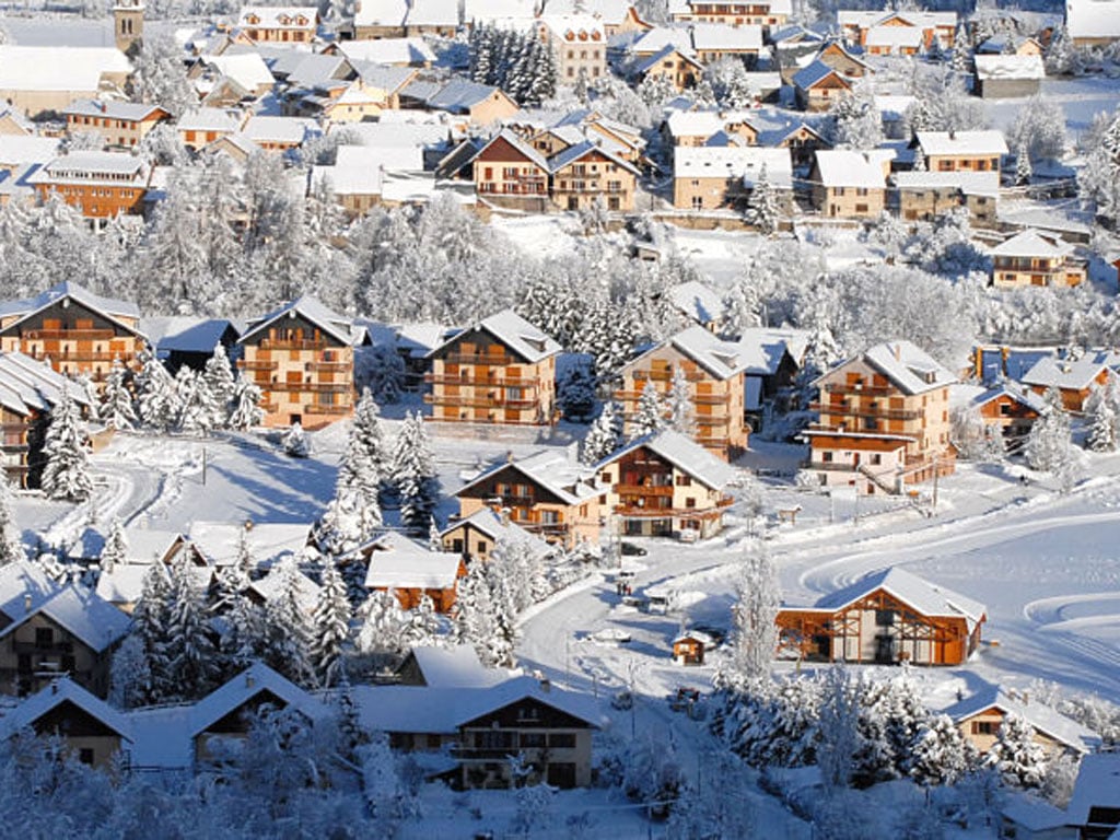 Ancelle in France - a snow covered village in the swiss alps.