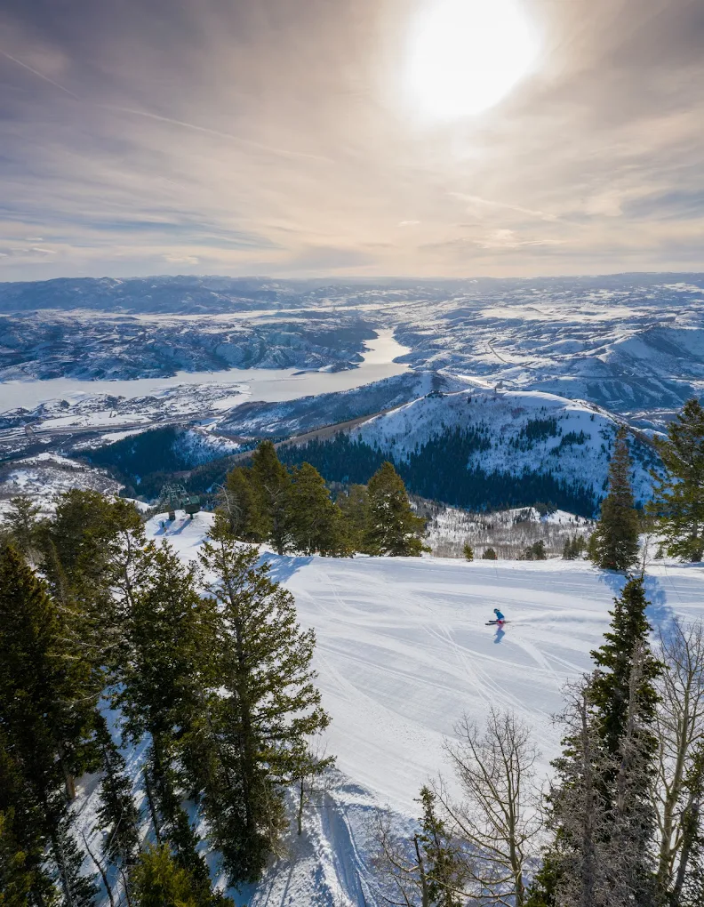 Deer Valley in USA - a view from the top of a snowy mountain.
