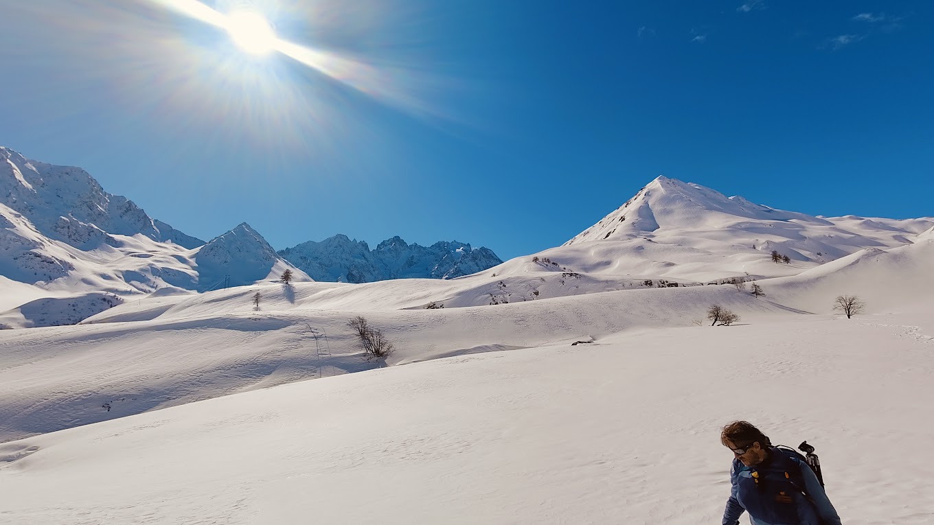 Villeneuve (Serre Chevalier) in France - a person on a snowboard in the snow.