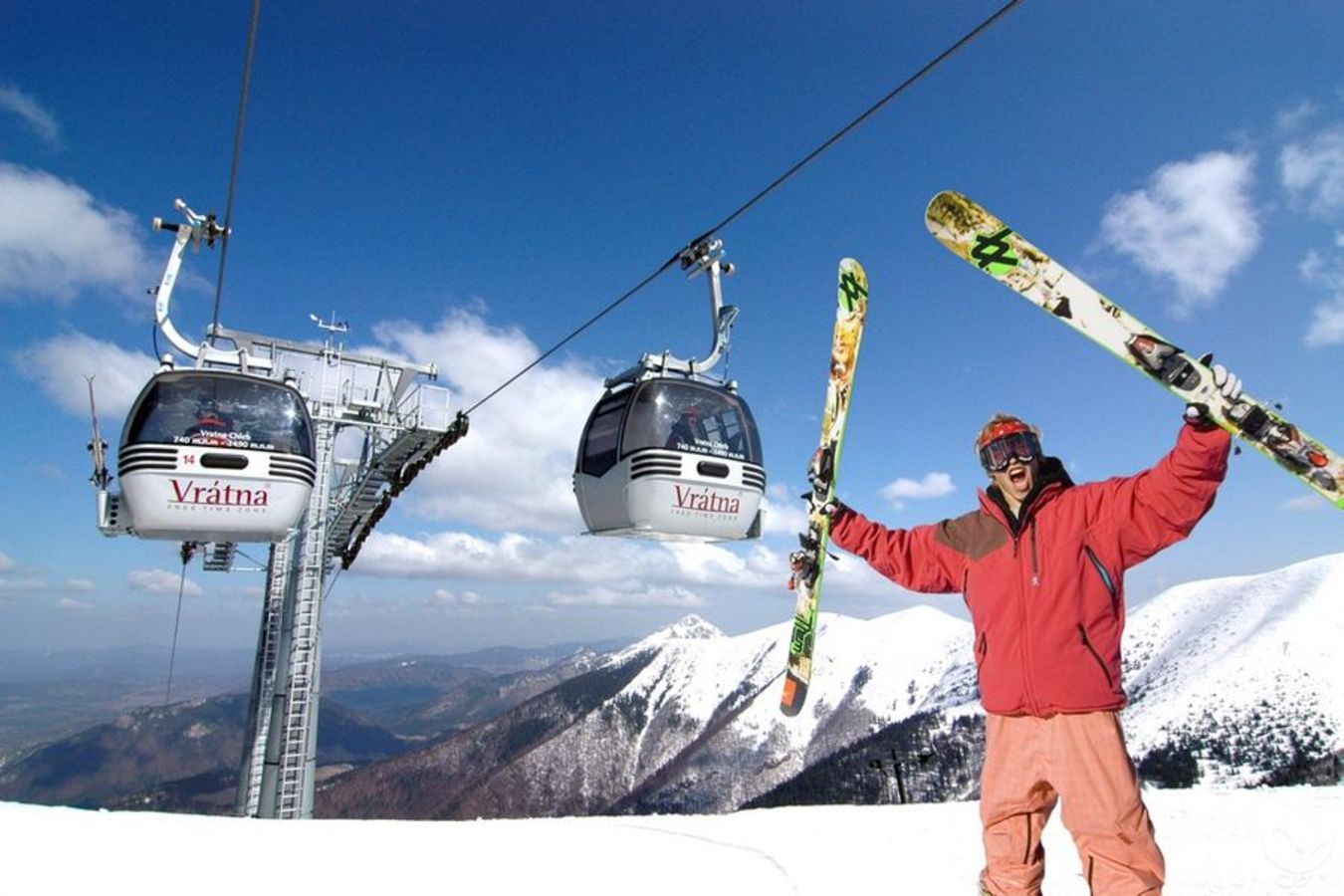 Vrátna in Slovakia - a man standing on top of a snow covered mountain.