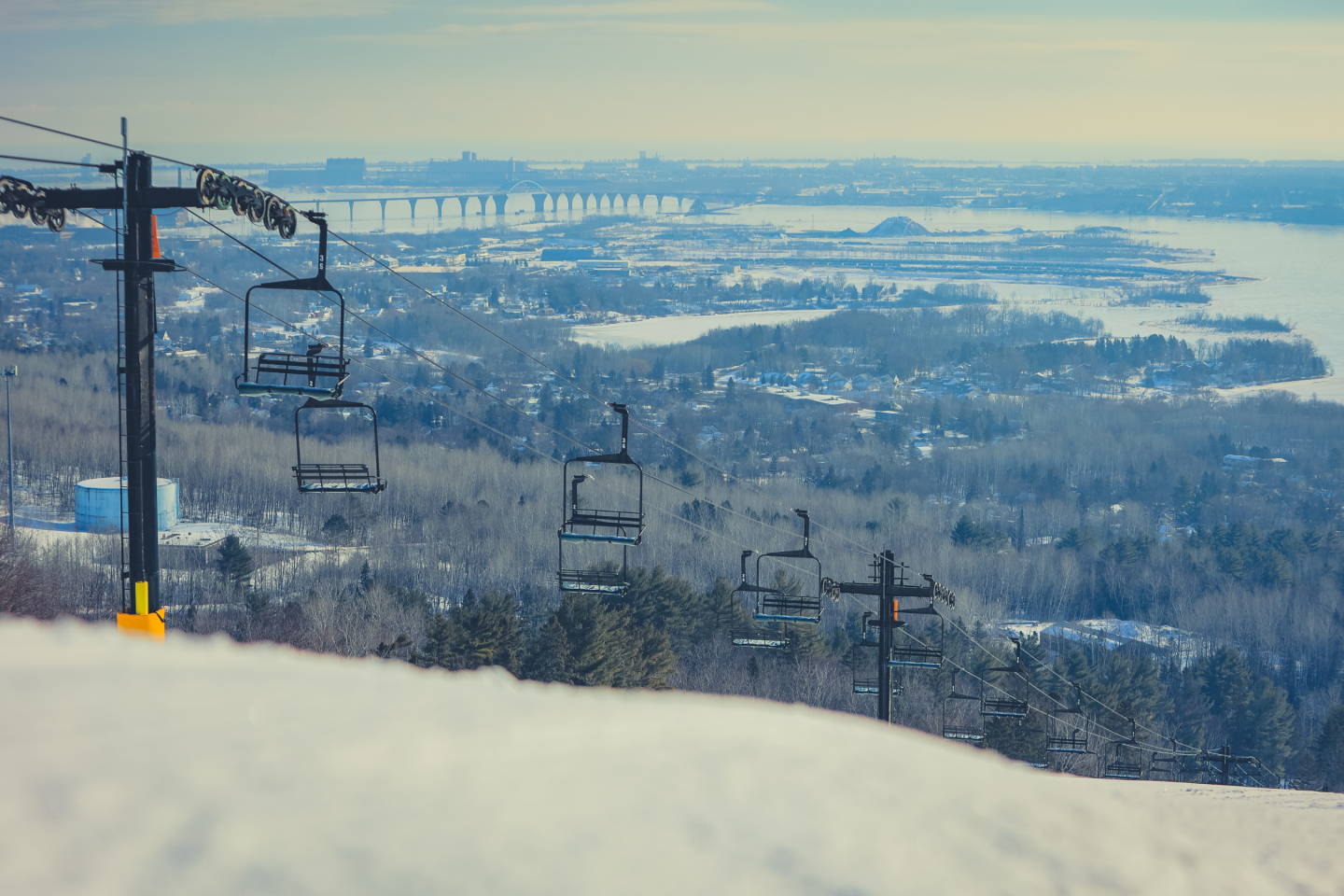 Spirit Mountain in USA - a ski lift going up a snowy hill.