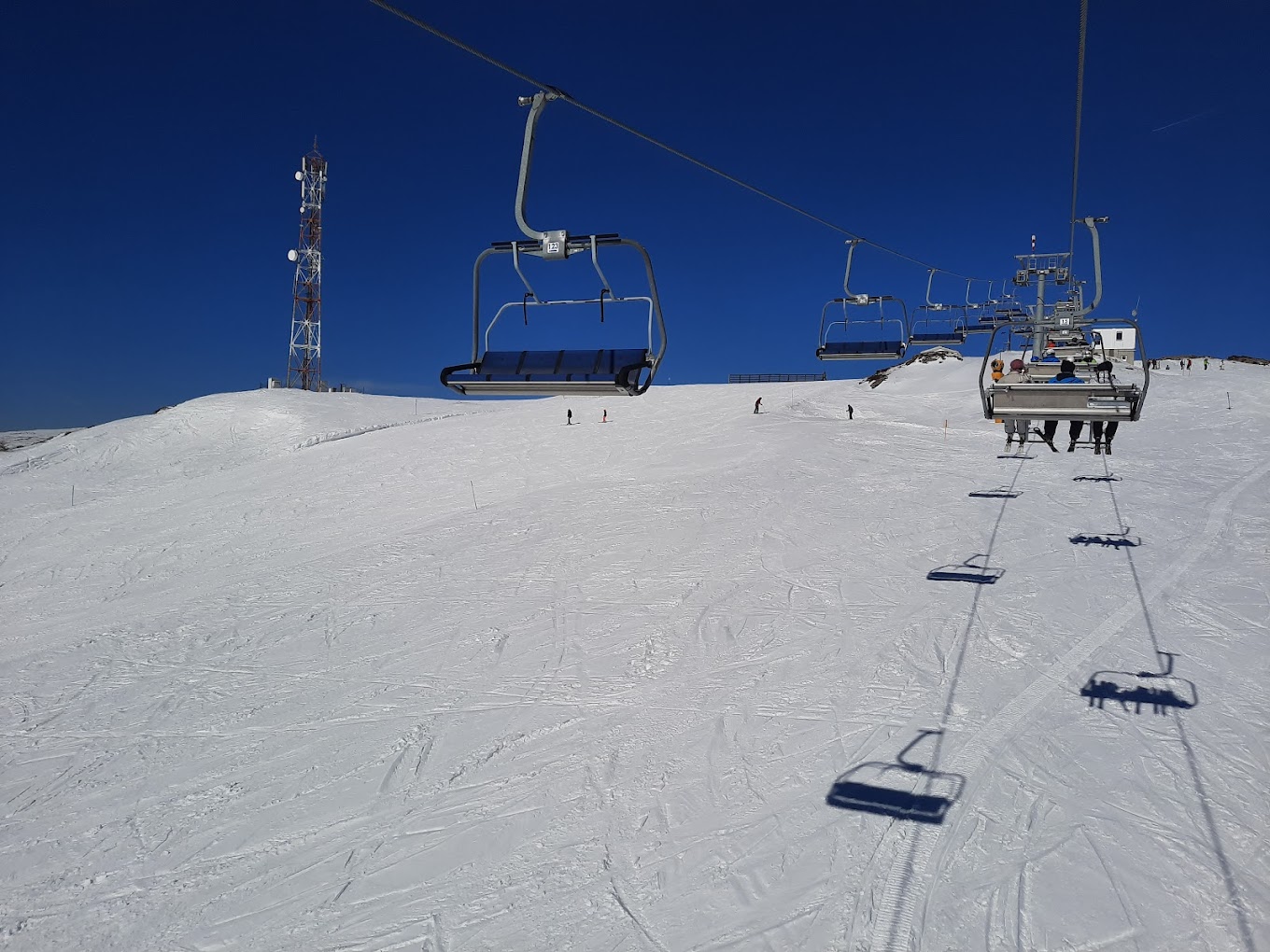 Stara Planina in Serbia - a ski lift going up a snowy hill.