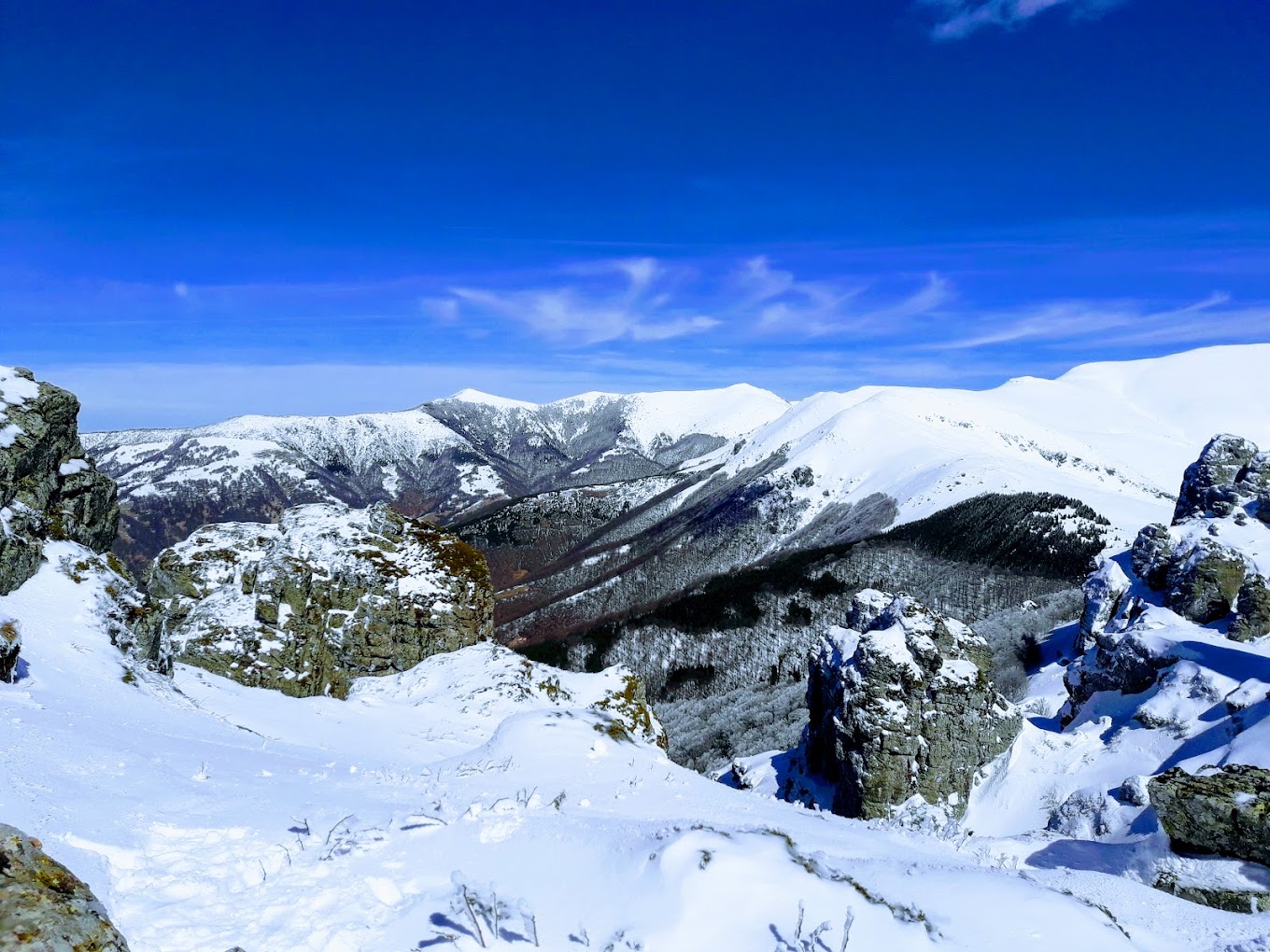 Stara Planina in Serbia - a view from the top of a snowy mountain.