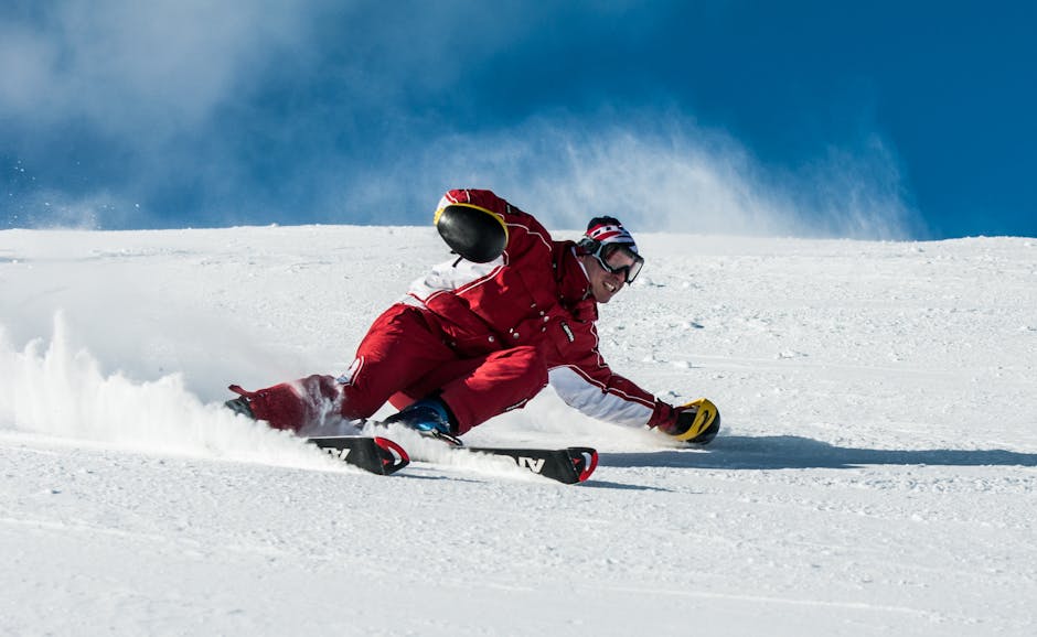 Stara Planina in Serbia - a person in a red jacket skiing down a snowy slope.