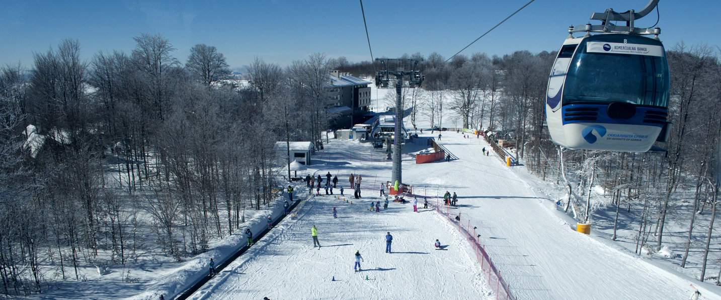Stara Planina in Serbia - a ski lift going up a snowy hill.