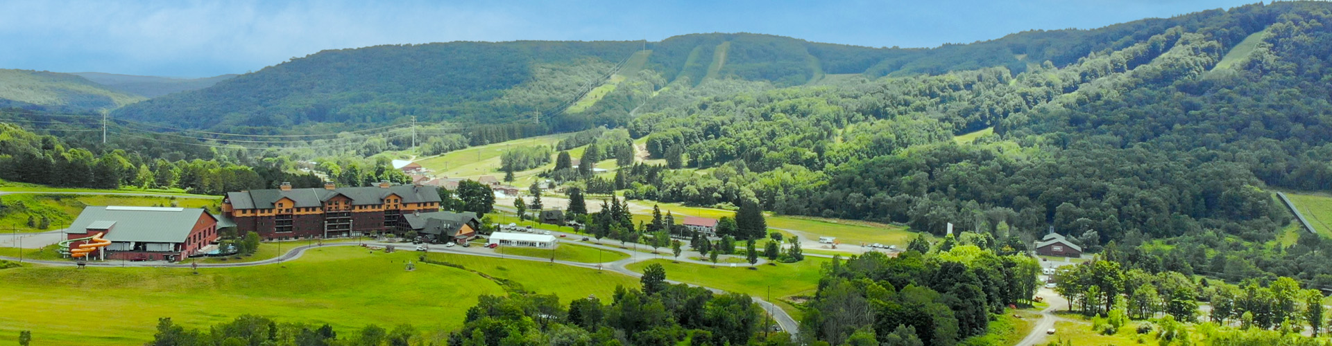 Greek Peak Mountain in USA - a house in the middle of a mountain range.
