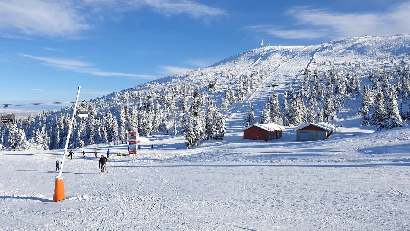 Trysil in Norway - people are skiing on the slopes of a mountain.